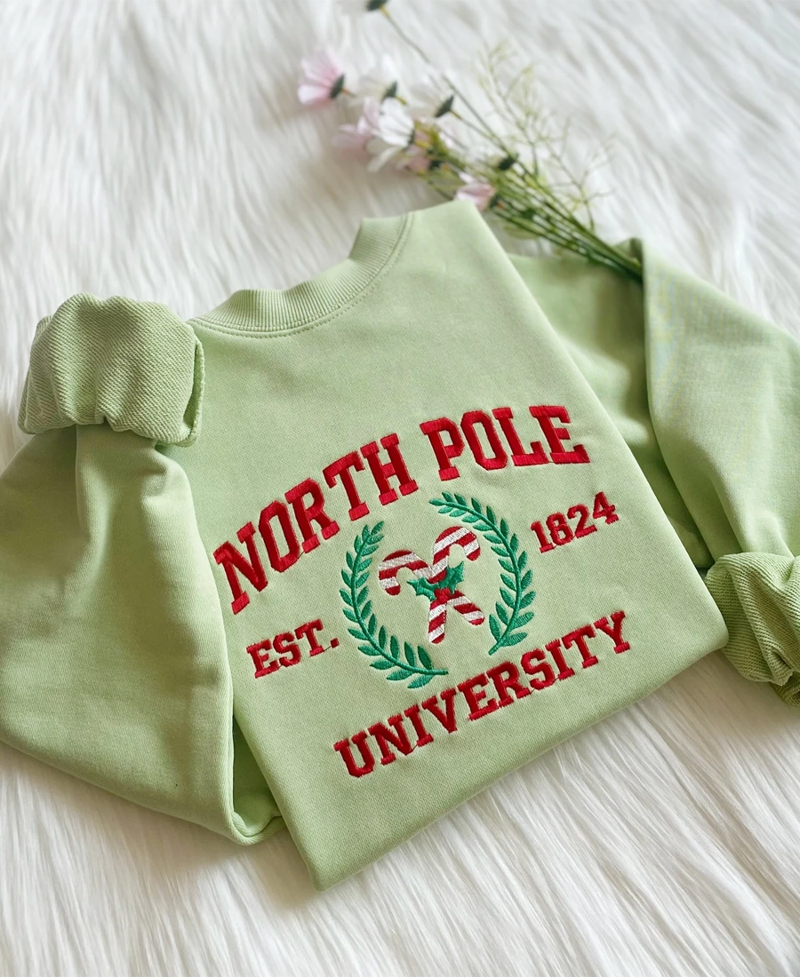 North Pole University Christmas Candy Sweatshirt North Pole University Christmas Candy Sweatshirt - Trendy Leather Jackets